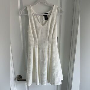 Women’s white fit and flare dress. New with tags. Size 9/10